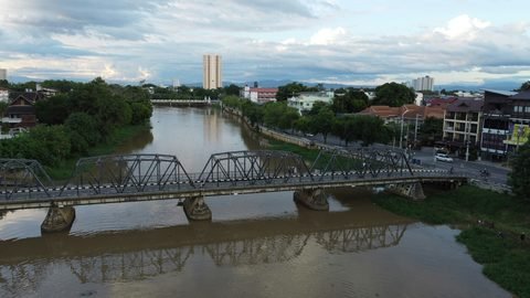 The iron bridge over the Ping River seen from above, with the city on both banks