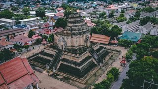 The truncated chedi of Wat Chedi Luang from the air, ringed by the modern city