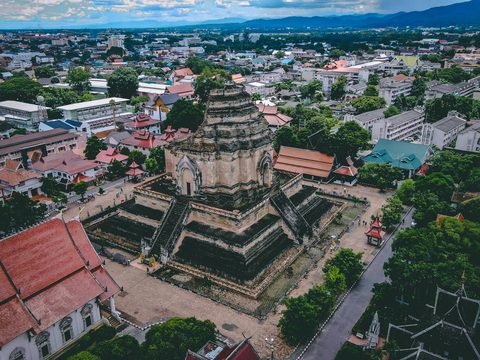Wat Chedi Luang's ruined brick chedi seen from above, surrounded by the roofs of the old city