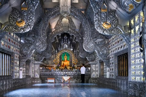 The silver-clad interior of Wat Sri Suphan's ordination hall